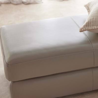 AUTOGRAPH Leather Ottoman with Low Natural Tone Legs